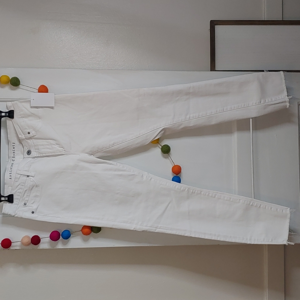 White Articles of Society jeans with raw hem